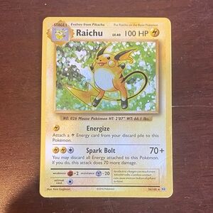 Raichu Pokémon Card - Gold and Yellow